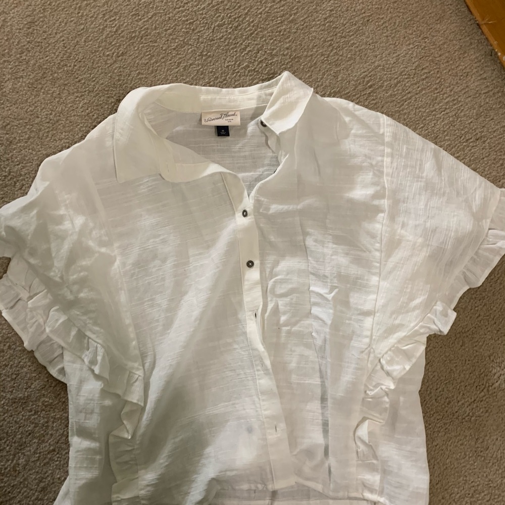 White ruffle blouse
